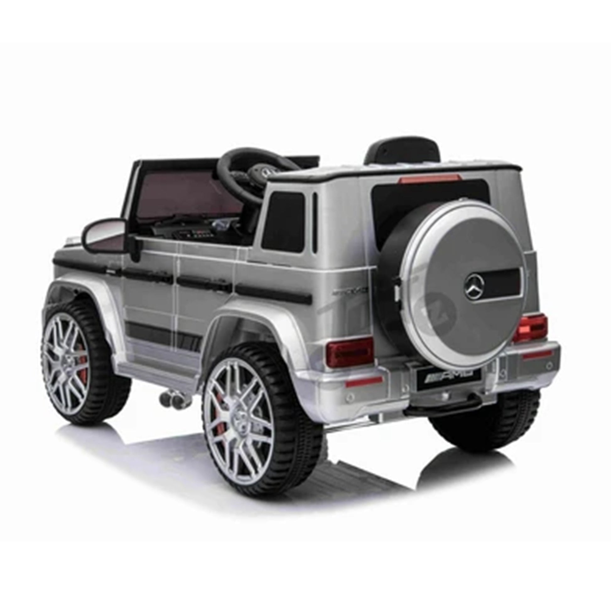 Alt text: A silver Mercedes-Benz G63 AMG 12V electric ride-on car for kids with remote control functionality.