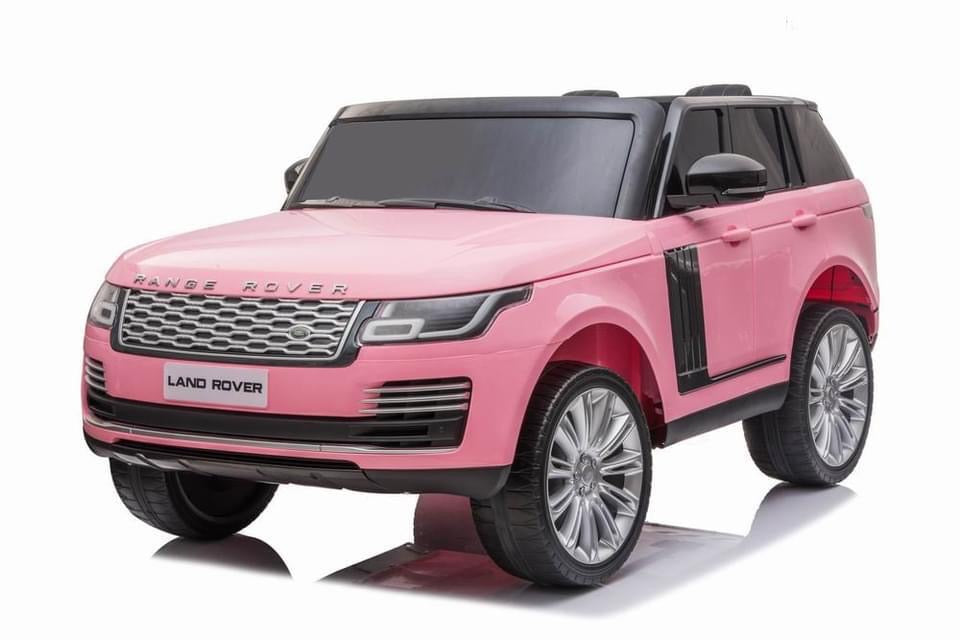 2 seater pink Range Rover Vogue HSE ride on jeep with parental control for kids against a white background