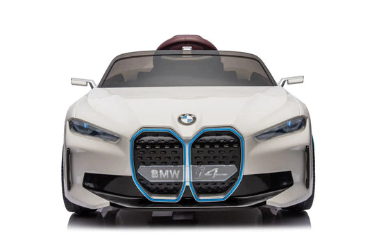 Front view of white BMW I4 electric ride on car for kids, 12 Volt