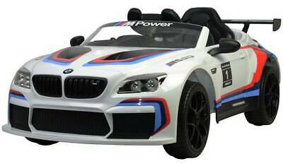 "White and blue BMW M6 GT3 12 Volt electric ride on car with remote control, showcased against a white backdrop."