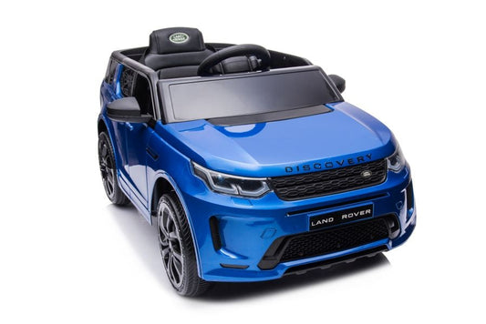 Blue Range Rover Discovery model, 12 Volt kids electric ride on car on a white background.