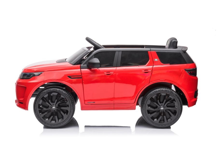 Red Land Rover Range Rover Discovery, 12 Volt SUV electric ride on car for kids side view against white background.