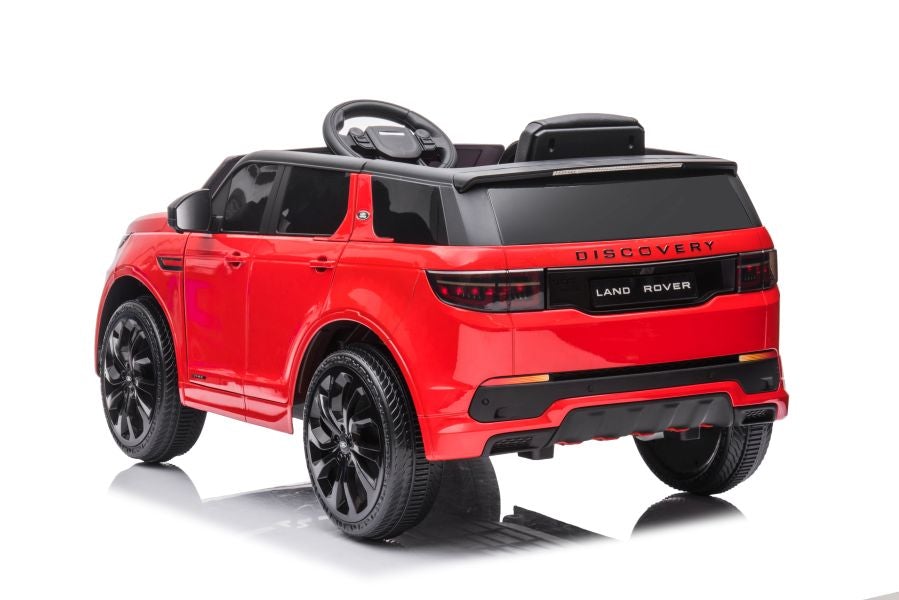 Red Land Rover Range Rover Discovery electric ride-on car for children with 12 Volt parental remote control on a white background.