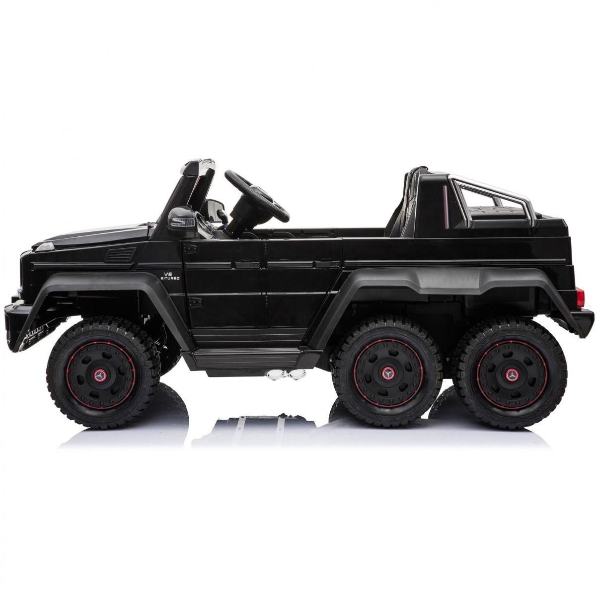 Six-wheeled black Mercedes G65 electric ride on jeep for kids, isolated on white background.