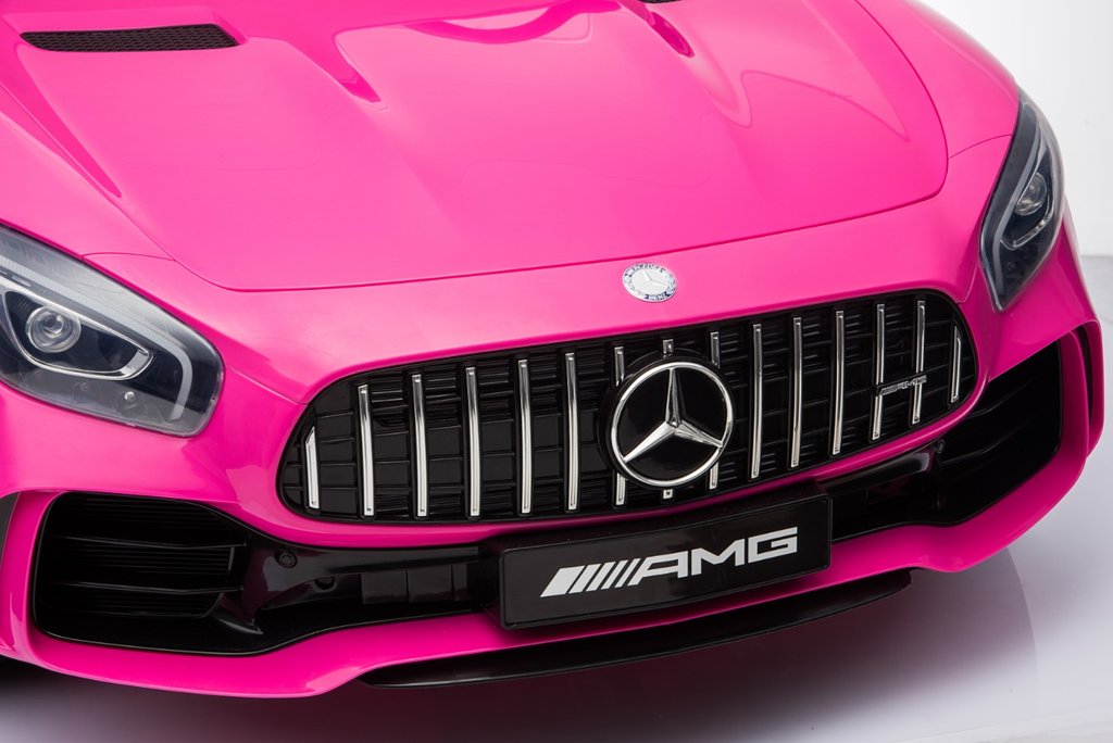 "Kids Car store: Pink 2-seater Mercedes AMG GTR with Parent Remote, 24v electric ride on car on a white background."