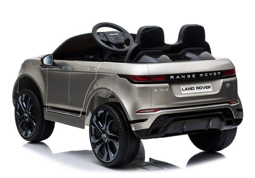 "White Range Rover Evoque Kids Electric Car with Remote Control on white background."