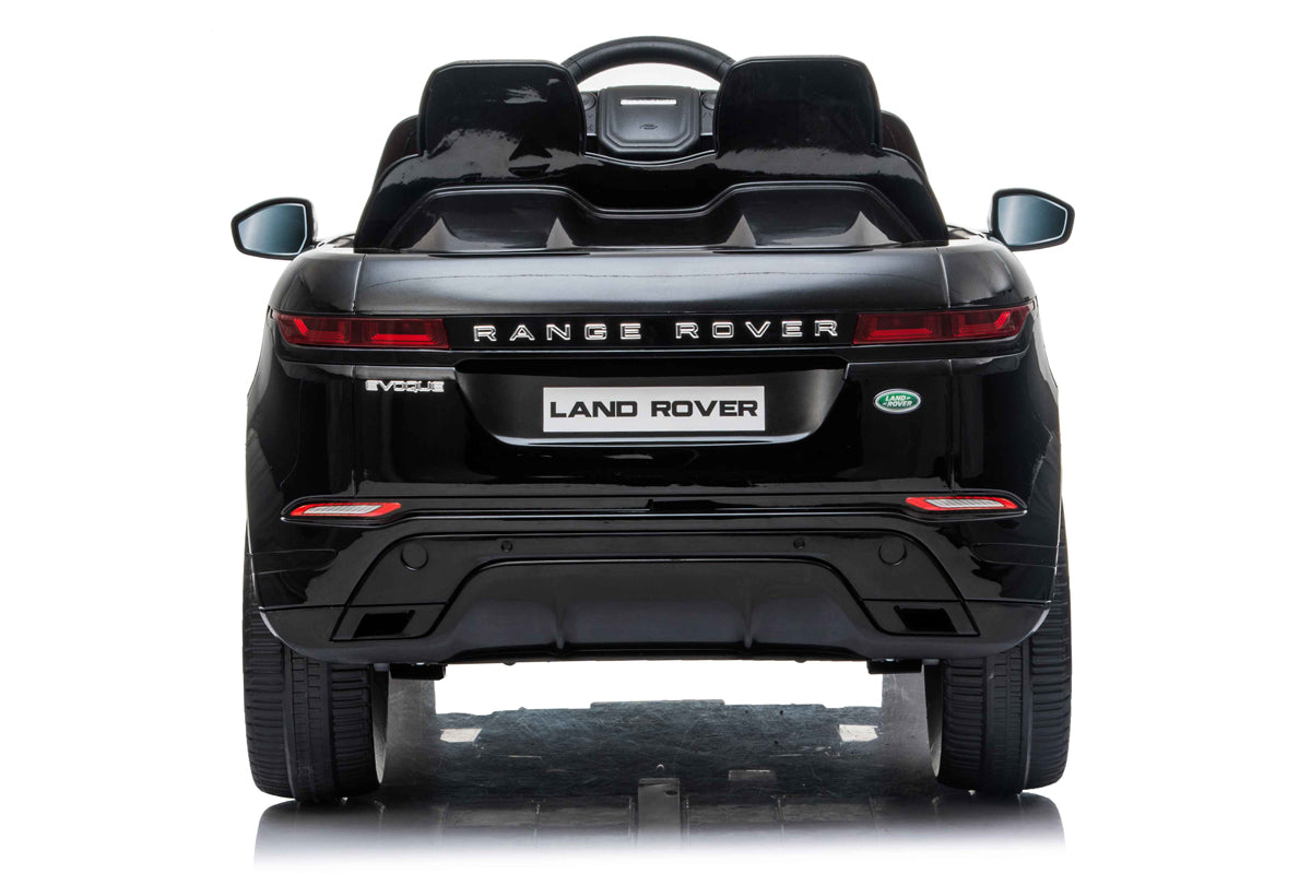 Black Range Rover Evoque kids electric ride-on car with parental control from rear view, white background