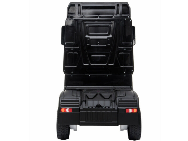 Black Mercedes Actros children's electric ride-on lorry with parental control, 24 volt, rear view.