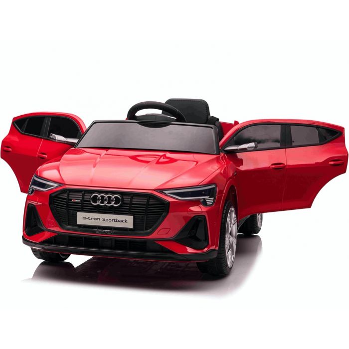 Red Audi e-tron Sportback replica electric ride on toy car for kids with open doors and parental remote control, situated on a white backdrop.