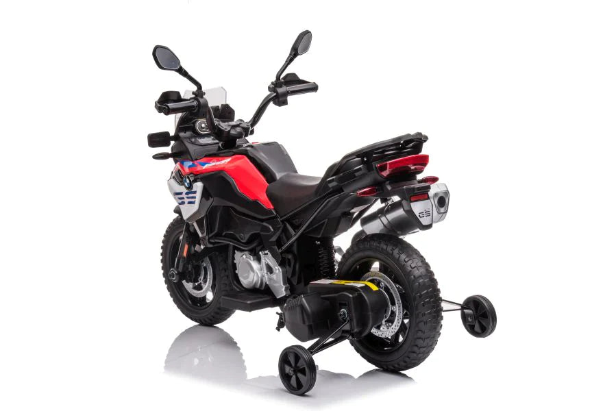 Red and black BMW children's electric ride-on motorbike with rubber wheels on a white background.