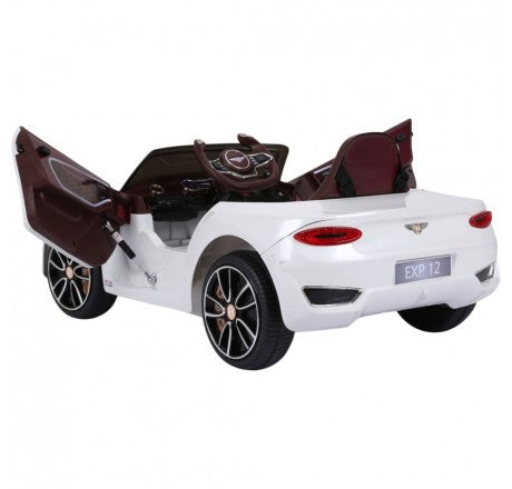 Alt text: White Bentley GT EXP12 toy car with open doors and 12v electric ride-on capability.