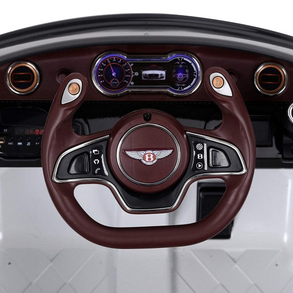 Bentley GT EXP12 kids electric ride on car 12 volt interior, showcasing luxurious steering wheel and dashboard".