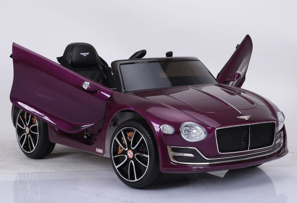 12 Volt purple Bentley GT EXP12 Kids Electric Ride On Car with open gullwing doors and MP3 compatibility.