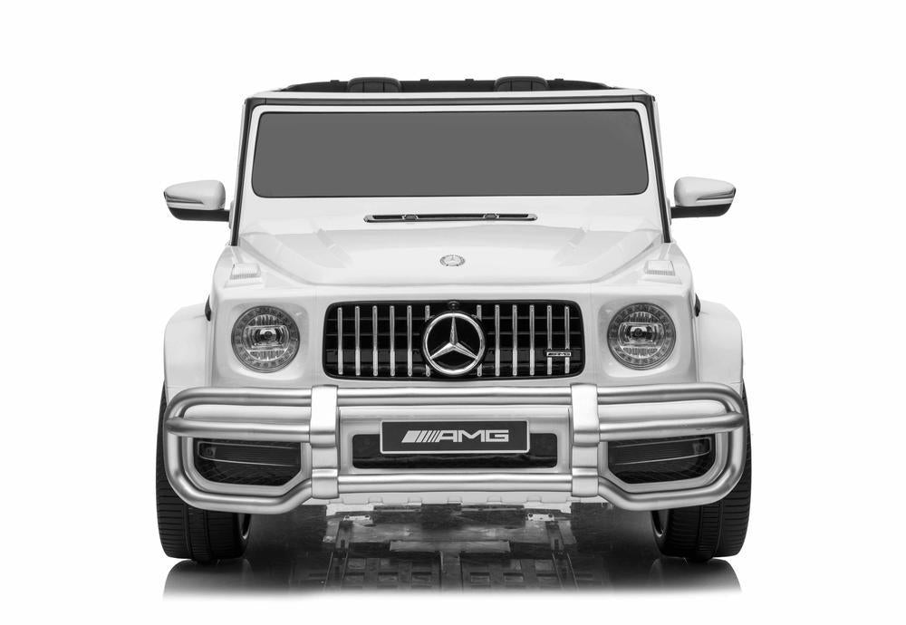 "White Mercedes G-Wagon AMG G63 2-seater electric kids car with 4-wheel drive capabilities"
