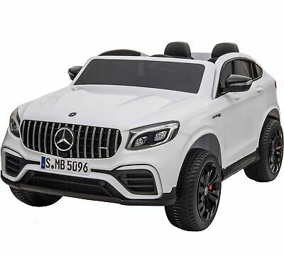 "White Mercedes AMG GLC63 S Coupe 2 Seater electric ride-on toy car for kids on a white background."
