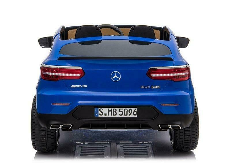 Rear view of a blue Mercedes AMG GLC63 S Coupe 2 seater kids ride on car, isolated on white background
