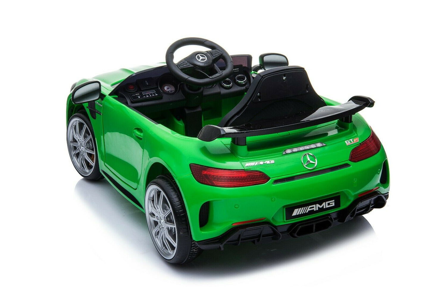 "Green Mercedes AMG GTR electric ride on car for kids on a white background"