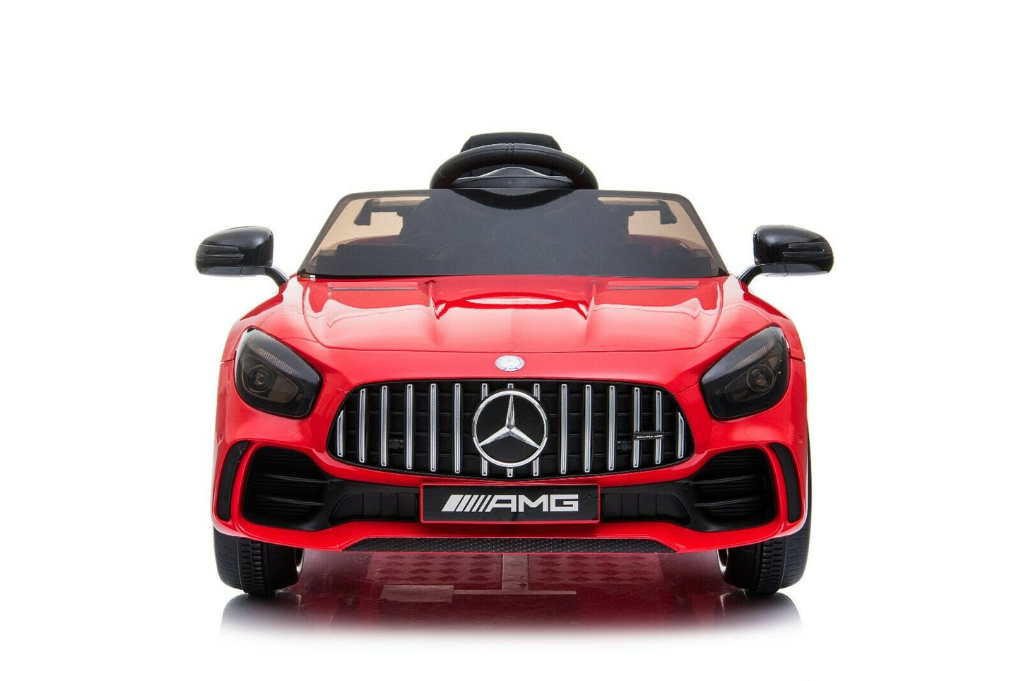 "Red two-seater Mercedes AMG GTR, electric ride-on car for kids with parent remote and music connectivity features, set against a white background."