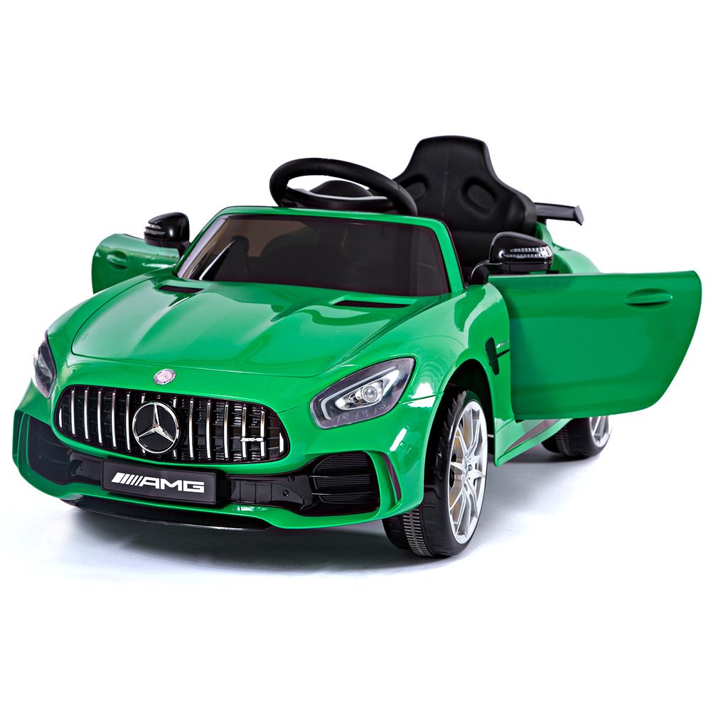 "Green Mercedes AMG GTR two-seater electric ride-on car for kids with parent remote, set on a white background."