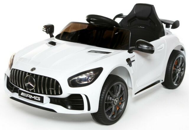 "Two-seater white Mercedes AMG GTR electric ride-on car for children, featuring parent remote control, officially licensed, powered by 12V"