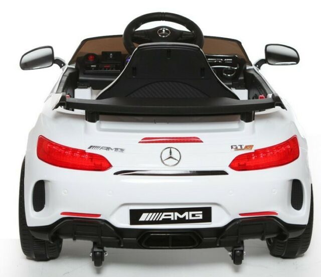 "White MERCEDES AMG GTR electric ride-on car with parent remote control, 2 seater, 12v power."