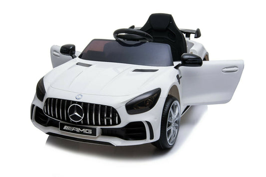 Alt text: "White Mercedes S-Class electric ride-on toy car resembling AMG GTR model"