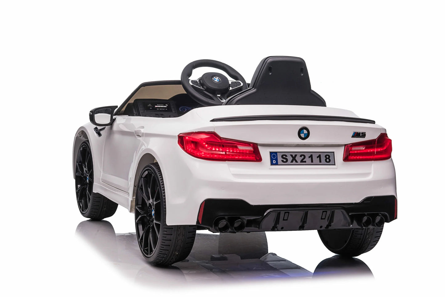 White BMW M5 Drift electric ride on car for kids, 24 Volt model, isolated on white background