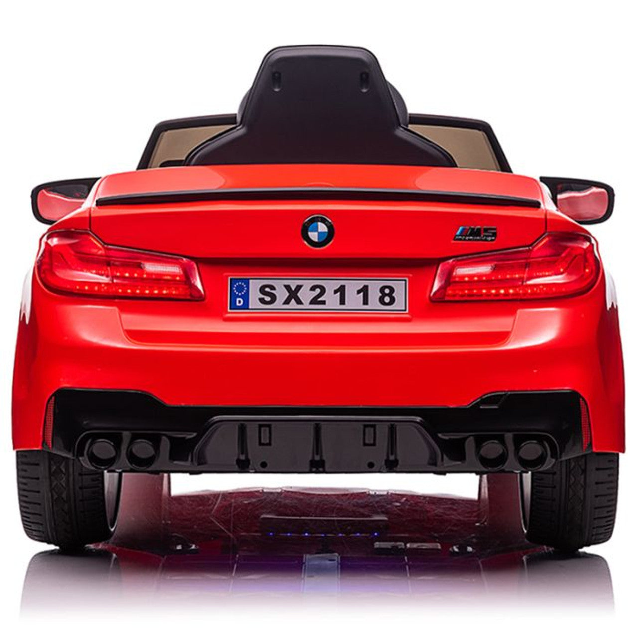 Rear view of a red BMW M5 Drift electric kids ride on car - 24 Volt convertible on a white background