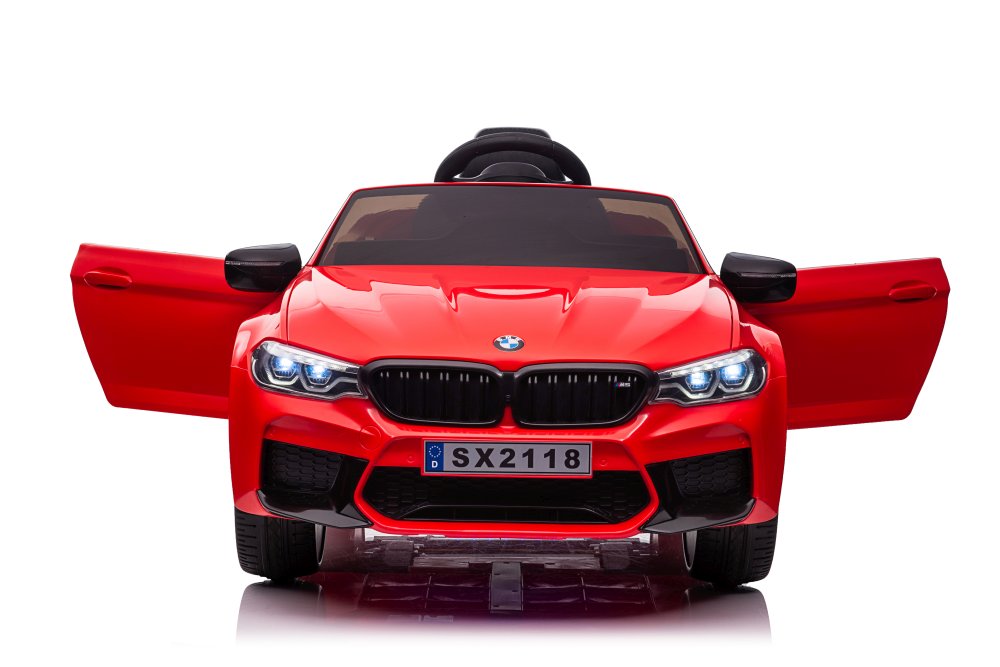 Red BMW M5 Drift electric ride-on car for kids, 24 Volt, with open doors on a white background.