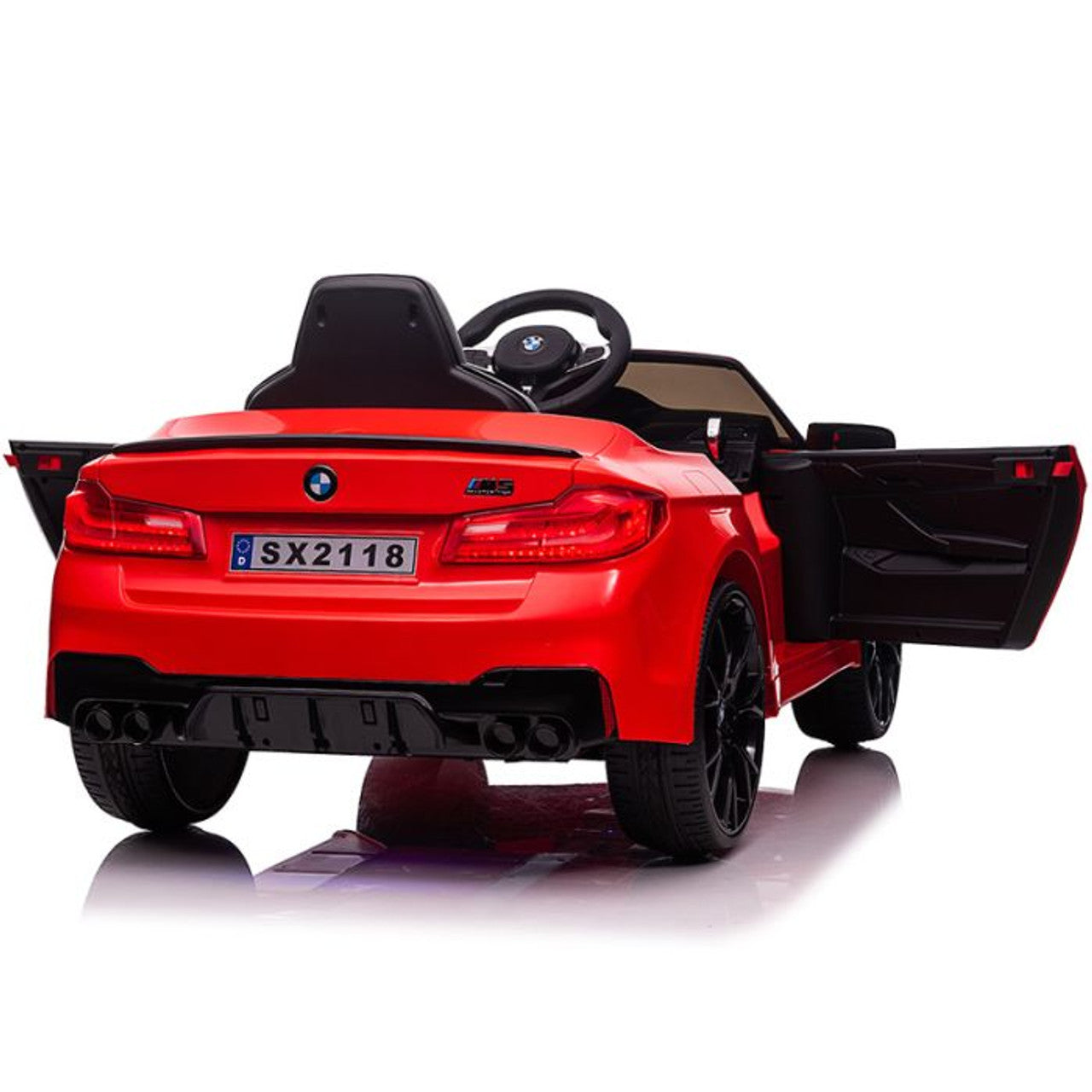 Red BMW M5 electric ride-on car with open doors for children on a white background.