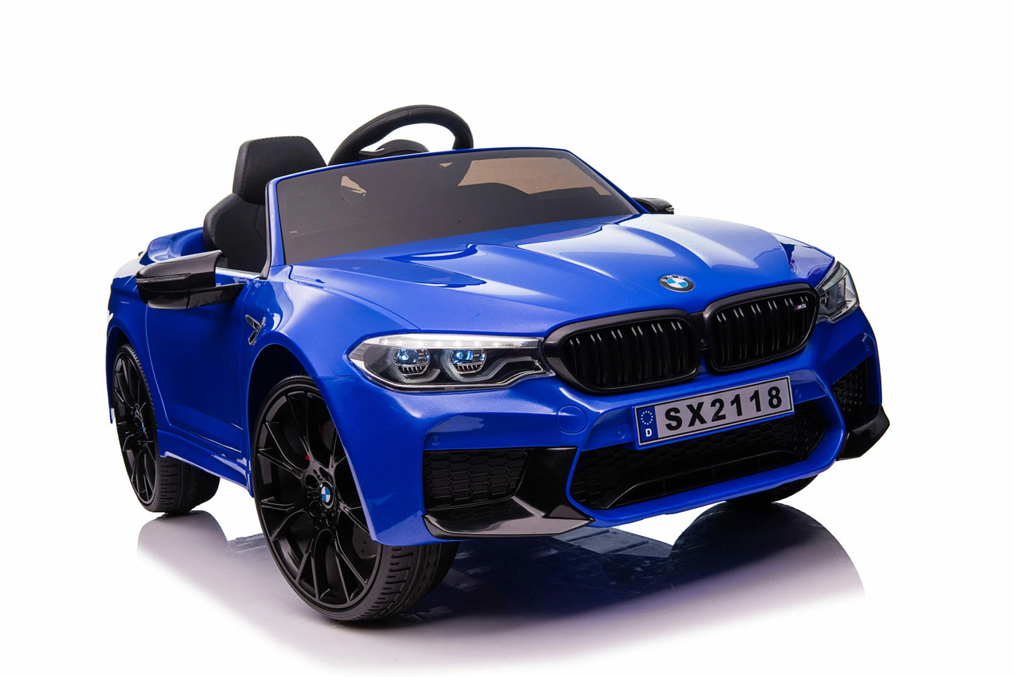 Blue BMW M5 Drift convertible, an electric ride-on toy car for kids on a white background