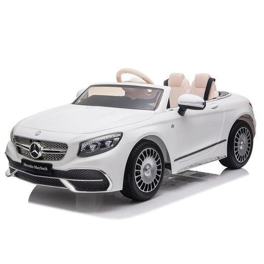 White Mercedes-Benz Maybach S650 electric ride on car for children with parental control features isolated on a plain backdrop.