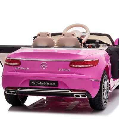 Pink Mercedes-Benz S650 electric ride on car for kids with parental control against white background.