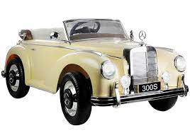 Beige Mercedes Benz 300S electric ride on car for kids, officially licensed replica with vintage cream convertible design and '300s' registration plate.