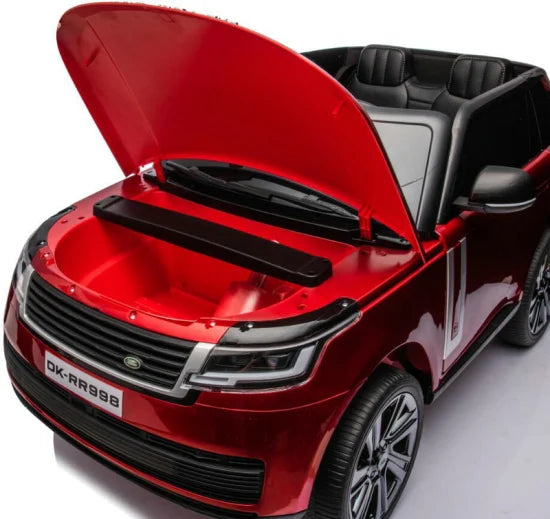 Red Range Rover licensed ride-on toy car for kids with open hood showcasing storage space, 24 volt model.