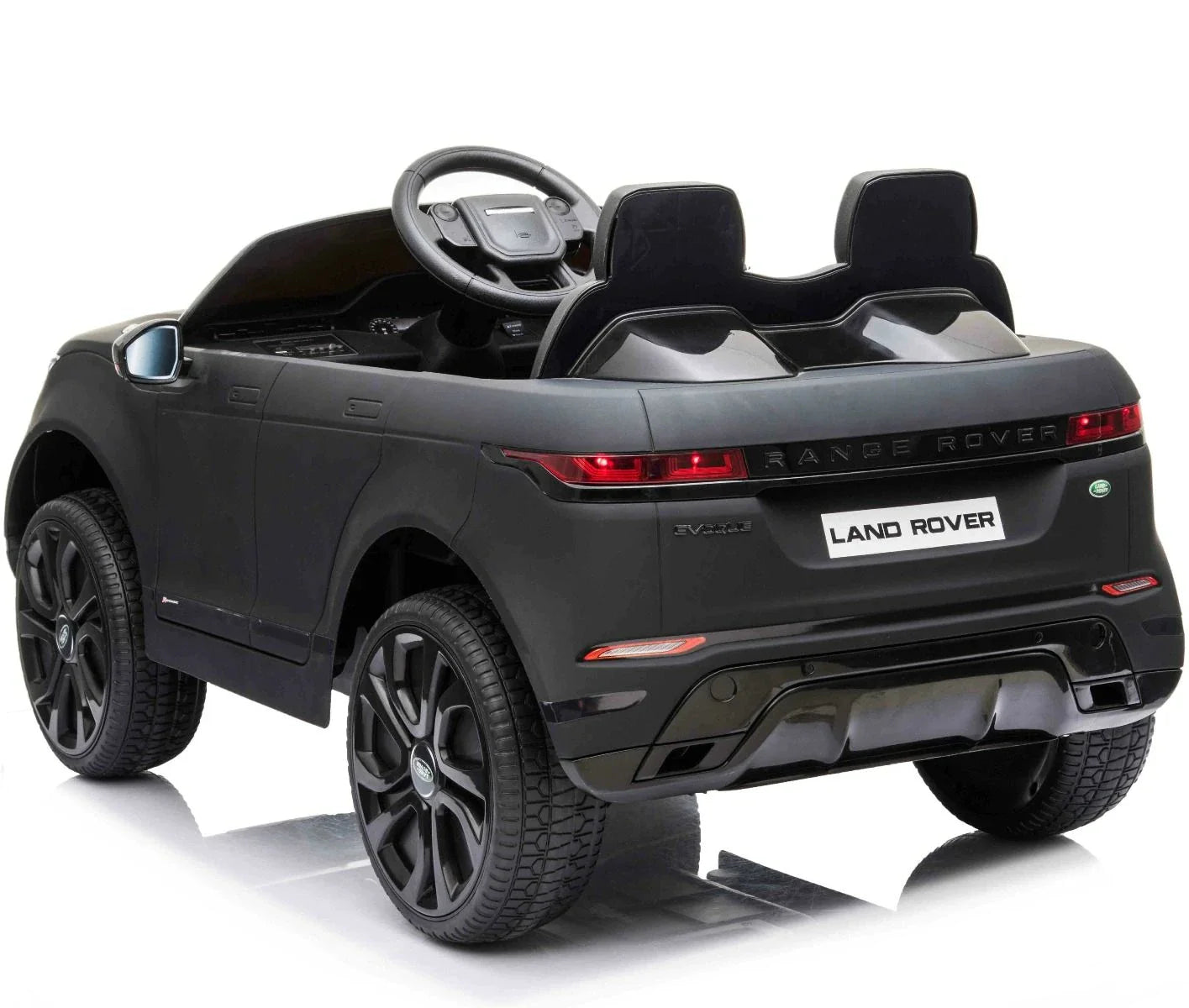 Matte Black Range Rover Evoque model, kids electric ride on car with parental control, isolated on white background.