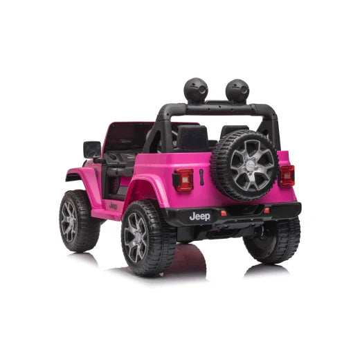 Red 4WD 12V Rubicon ride on car for children with spare tire, isolated on white background.