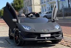 "Matt Black Lamborghini SVJ Kids Ride On from Kids CarA with 2.4G Parent Remote Control feature for easy maneuverability."