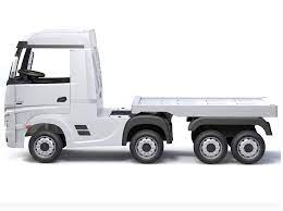 White Mercedes Actros children's electric ride-on trailer with Eva rubber wheels on a plain background