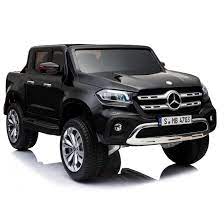 Black Mercedes X-Class pickup electric ride-on toy for children in white background