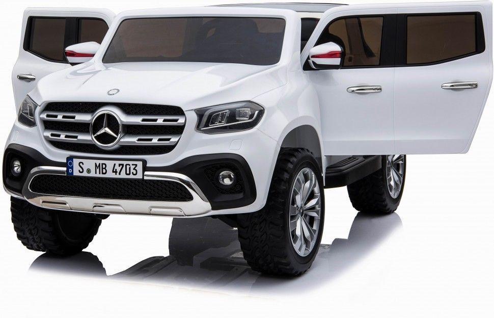White Mercedes-Benz X Class 24v pickup for kids with six doors and 4WD, electric ride on feature, isolated on a plain background.