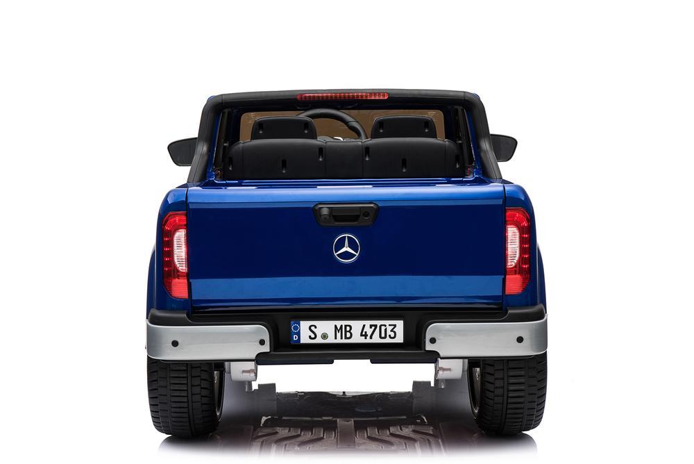 Rear view of a blue Mercedes X Class Pickup Electric Ride on 24 Volt for kids on a white background.
