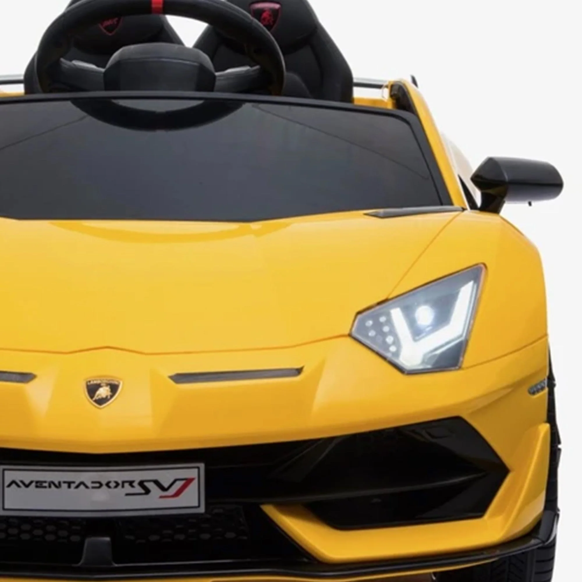 Yellow Lamborghini SVJ 12 Volt Electric Ride on from KidsCar.co.uk, featuring 2.4G remote control and leather seat, displayed on white background.
