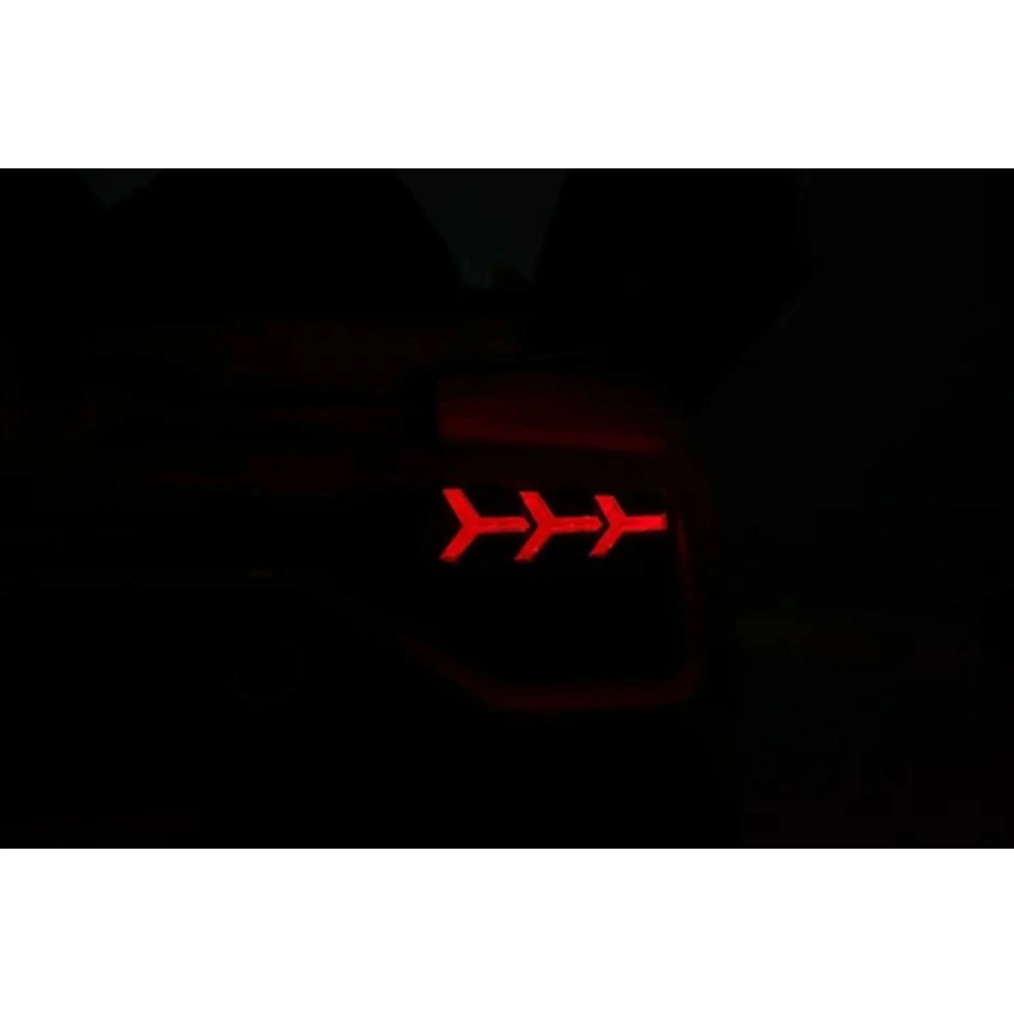 "Matt Black Lamborghini SVJ electric ride-on car with red tail lights, available in Kids Car store. Comes with remote control for extra convenience."