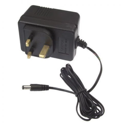 "Universal 12V battery charger with black AC adapter for child's ride-on vehicles"