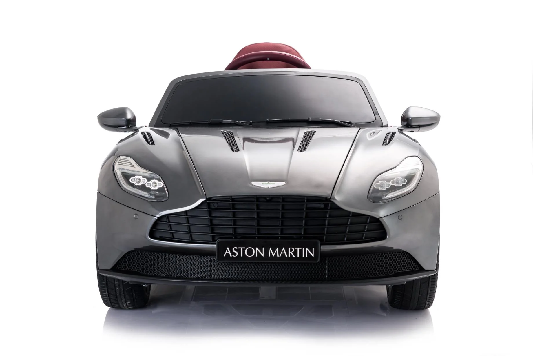 "Grey Aston Martin DB11 electric ride on car for kids on white background"