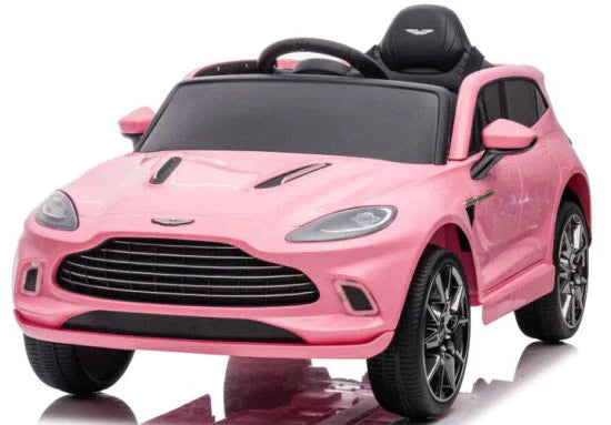 Pink Aston Martin DBX Kids ride on car 12v