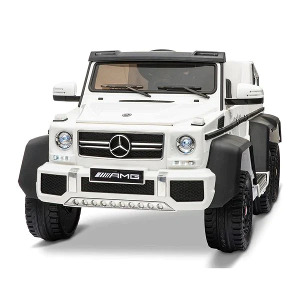 White Mercedes G65 electric ride-on jeep model for kids on a plain background