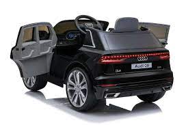 Black Audi Q8 SUV Children's Electric Ride on 12 Volt Toy Car with Door Open and Bluetooth Parental Remote Control Features.