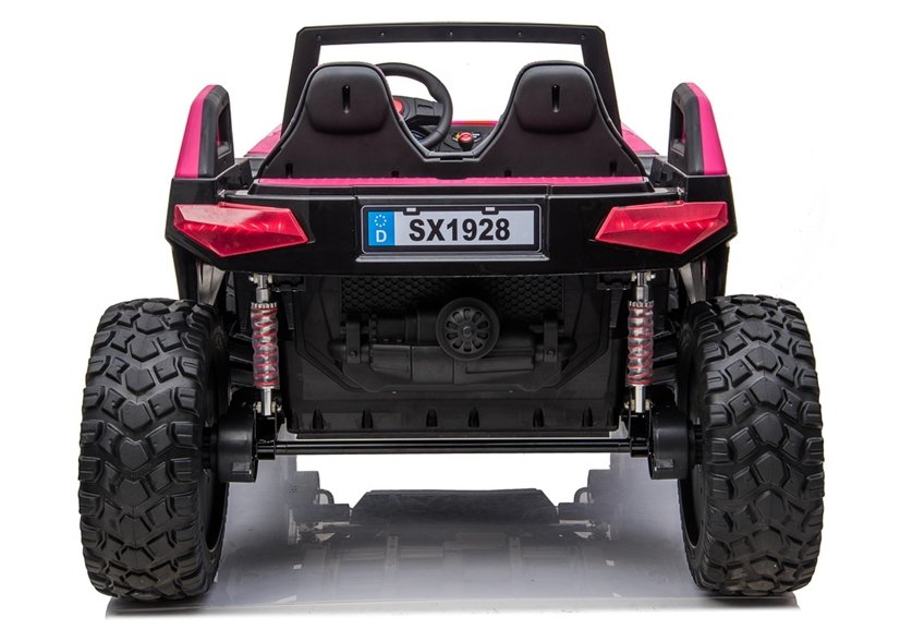 Rear view of black and pink Clash Buggy 24v two-seater ATV with off-road tires and exposed suspension